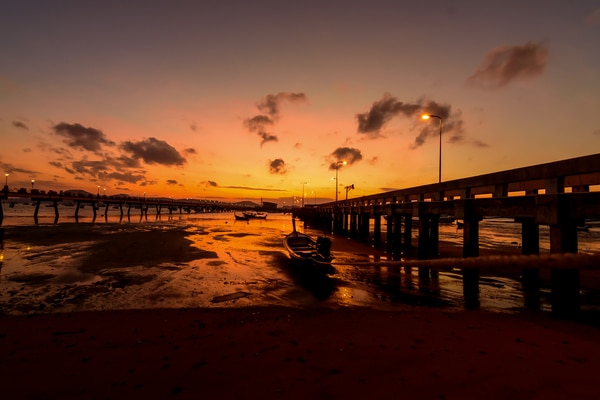 Sunset from the beach between the two jetty's at Chalong Pier