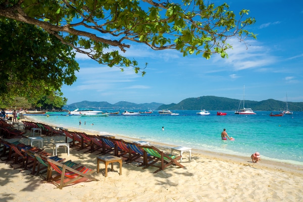 coral island as seen from the foreshore of long beach looking out in the crystal blue waters