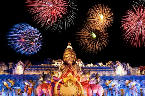 fireworks being set off and illuminating the Phuket Fantasea grounds below