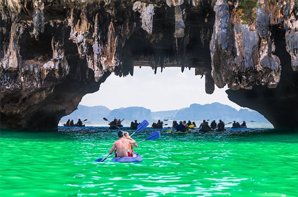 tourists kayaking in Phang Nga Bay