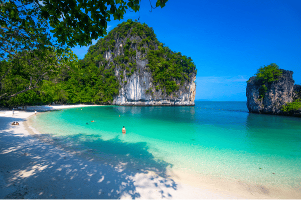 people strolling along koh hong beach