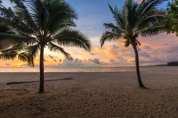 the beach at nai yang beach as seen at sunset totally devoid of tourists